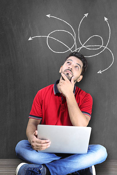istock Confused young man with laptop 481619066
