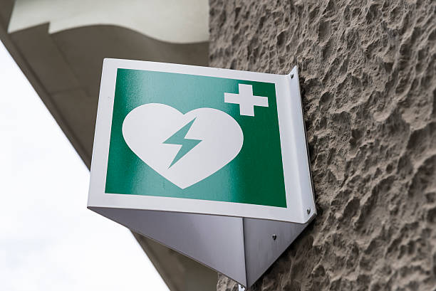 istock AED Automated External Defibrillator Emergency Sign Mounted on a Wall 481619422