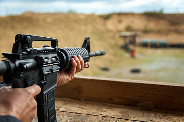 istock shooting, shooting on the street, ground, guns, shooting, shells 481619834