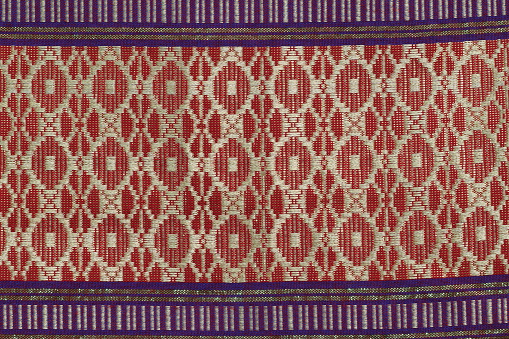 Colorful Thailand style rug surface close up vintage fabric is made of hand-woven cotton fabricColorful Thailand style rug surface close up vintage fabric is made of hand-woven cotton fabric