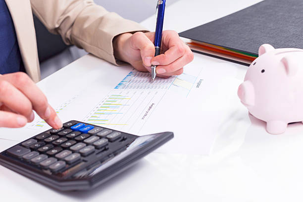 istock Women calculate expenses 481627411