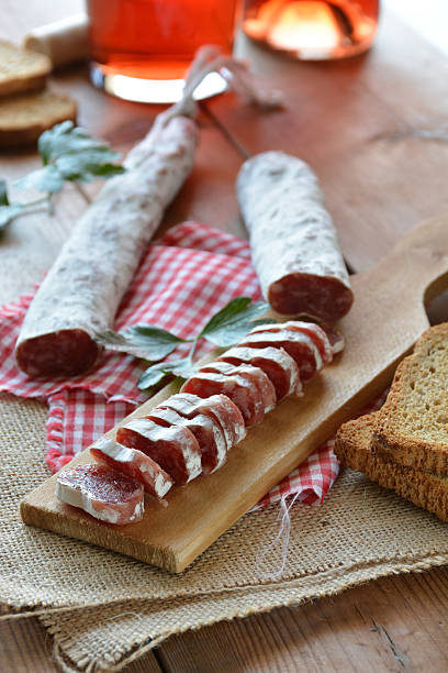 istock Spanish fuet salami on a cutting board 481628346
