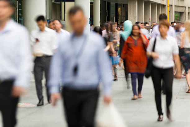 Office workers commuting at Raffles Place, Singapore stock photo