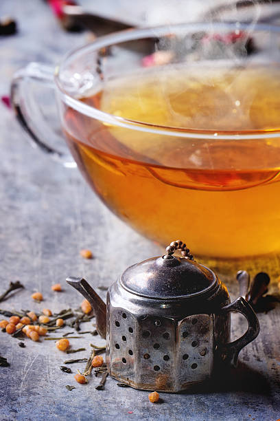 istock Cup of hot tea with teastrainer 481632328