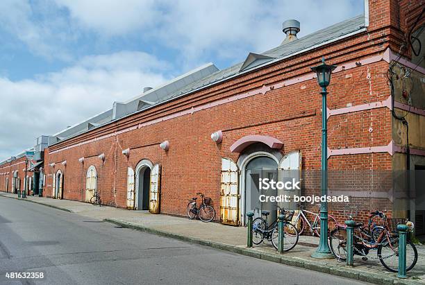 Red Brick Warehouse With Bicycles Stock Photo - Download Image Now - Hakodate, 2015, Alley