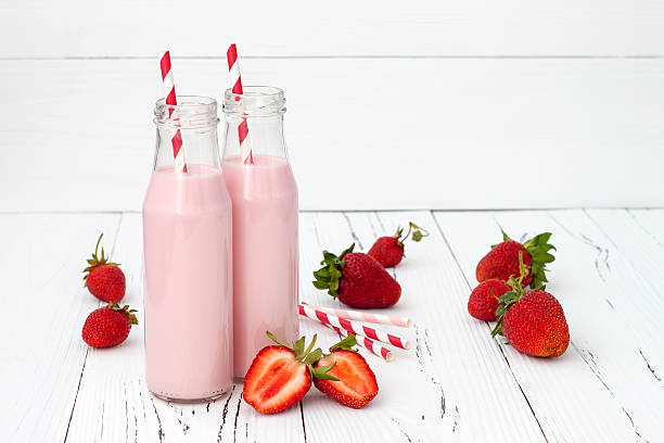 Strawberry milk in traditional glass bottles