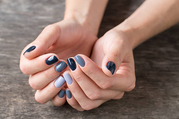 istock Beautiful hands with the miniature painted in a gray-colored 481633496