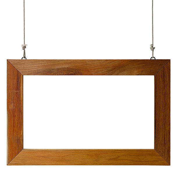 istock Natural Teak wood  wood frame hanging by old rope. 481634094