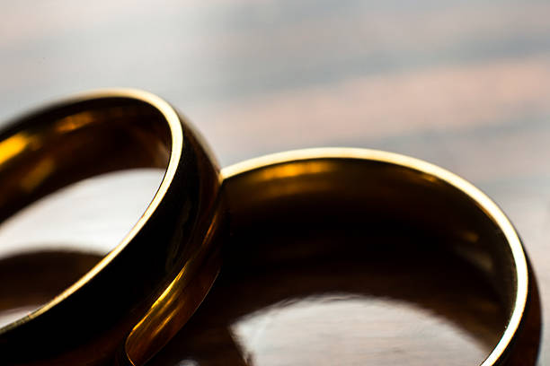 istock Pair of gold wedding rings 481635780