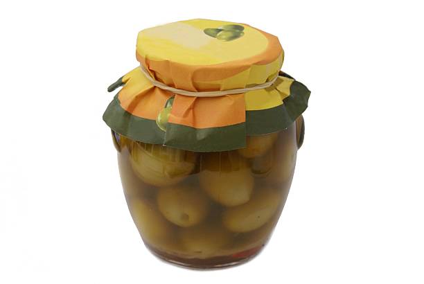 istock Green olives in glass jar 481636246
