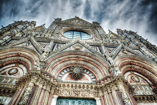 istock Santa Maria Assunta facade in Siena under a dramatic sky 481639592