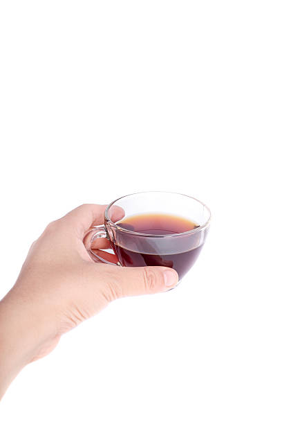 istock Woman's hands holding cup of coffee on white background 481640470