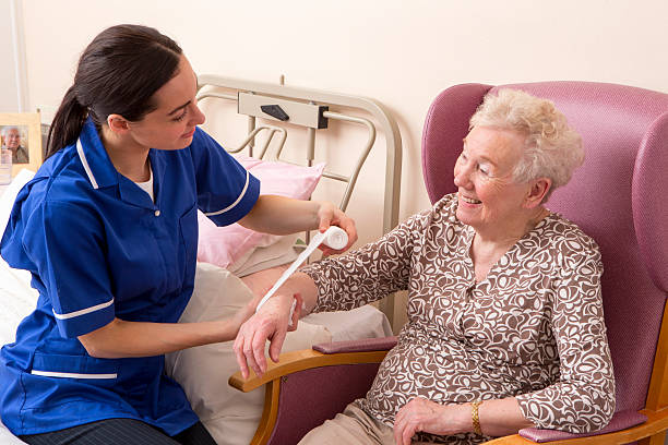 istock Happy Nurse and Senior Patient 481644953