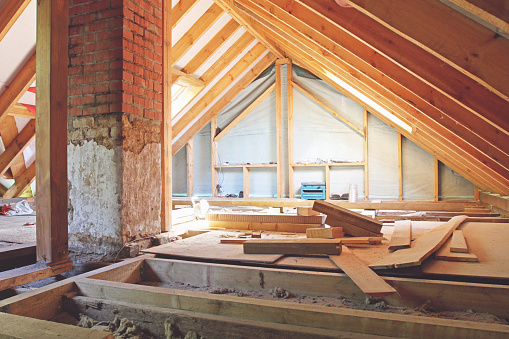 an interior view of a house attic under construction