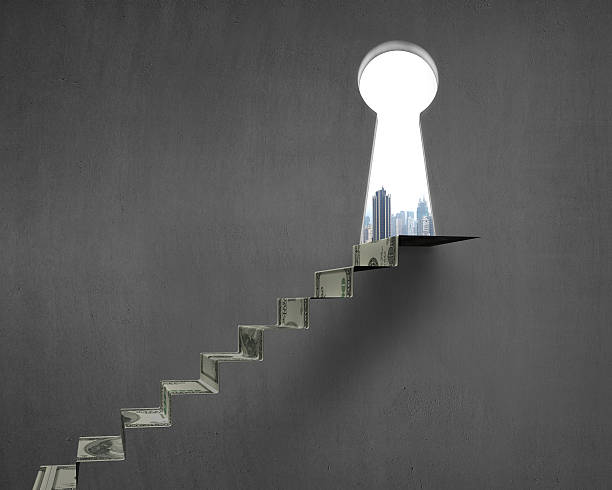 istock Key shape hole with money stairs 481647111