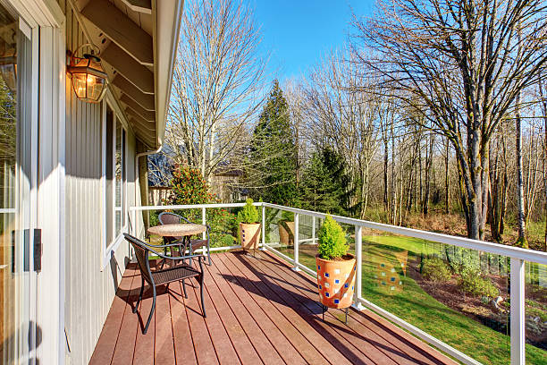 istock Nice back porch with glass fencing and chairs. 481653950