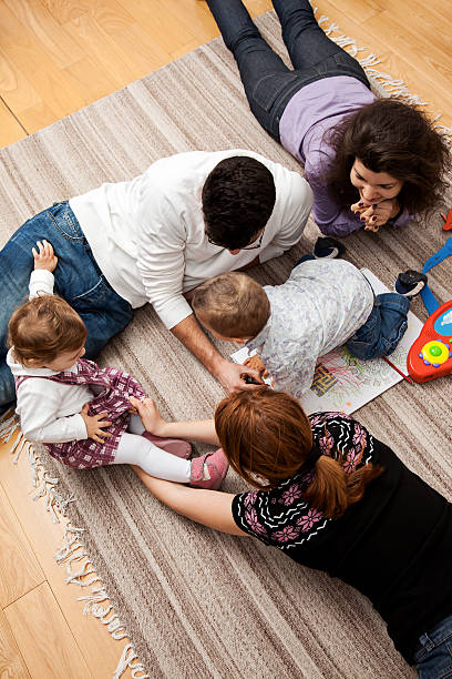 istock family play floor home 481656138