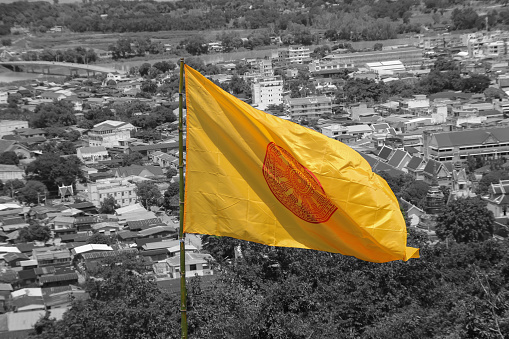 Yellow flag logo pattern Dharmachakra (Wheel of Dhamma)  Buddhism in  Nakhon Sawan, Thailand