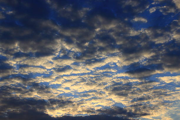 istock summer sunset with blue sky and sun 481657890