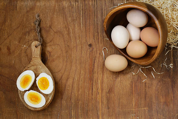 istock Farm natural organic eggs on a wooden background 481658652