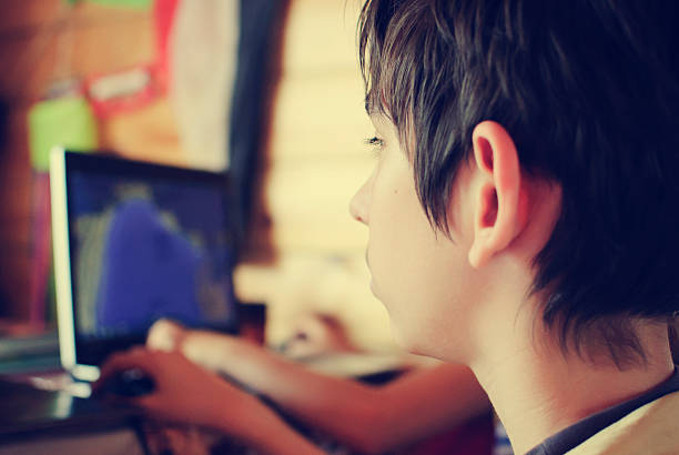 istock children and a computer monitor 481664658