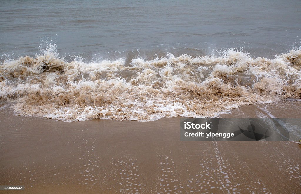 ebb waves on beach 2015 Stock Photo