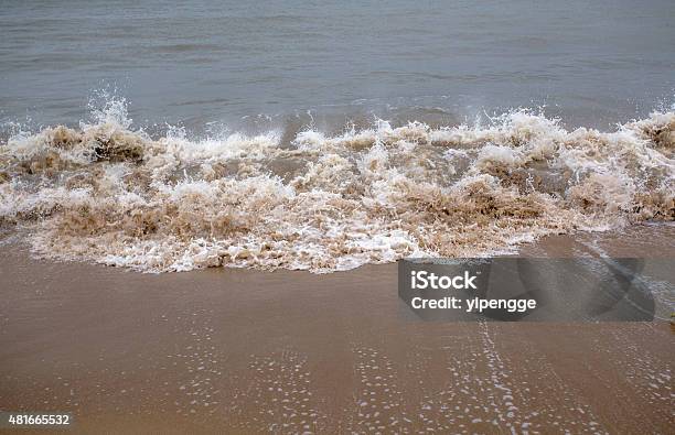 Ebb Waves On Beach Stock Photo - Download Image Now - 2015, Beach, Calm Before The Storm