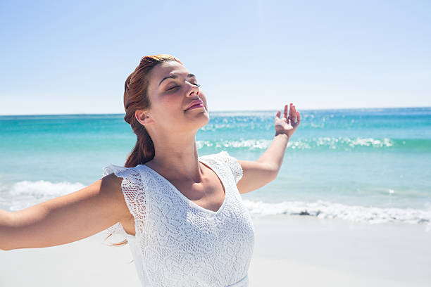 istock Pretty brunette standing arms outstretched 481666118