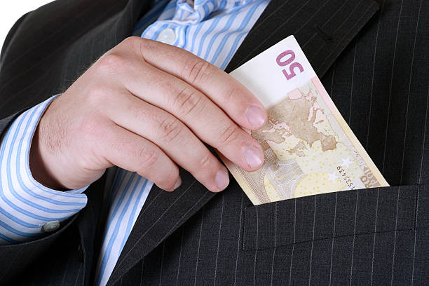 istock Man hiding money in pocket 481667729
