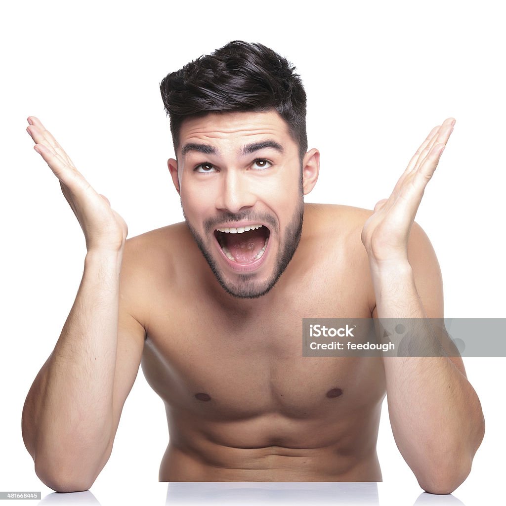 surprised naked man looking up super surprised naked man looking up on white background Adult Stock Photo