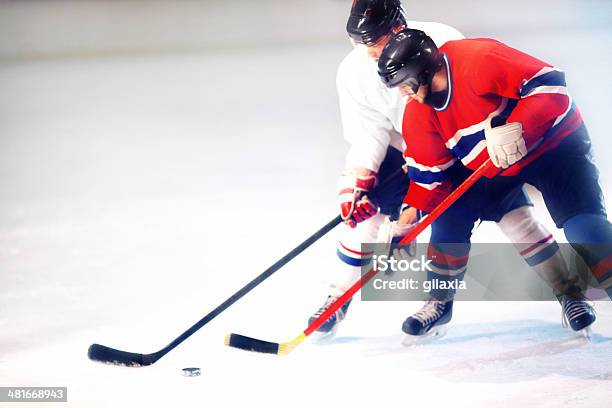 Hockey Sobre Hielo Foto de stock y más banco de imágenes de Hockey sobre hielo - Hockey sobre hielo, Deporte, Movimiento