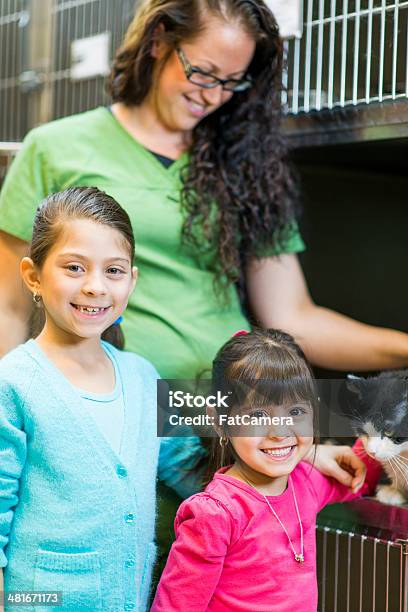 Pet Adoption Stock Photo - Download Image Now - 30-39 Years, 6-7 Years, 8-9 Years