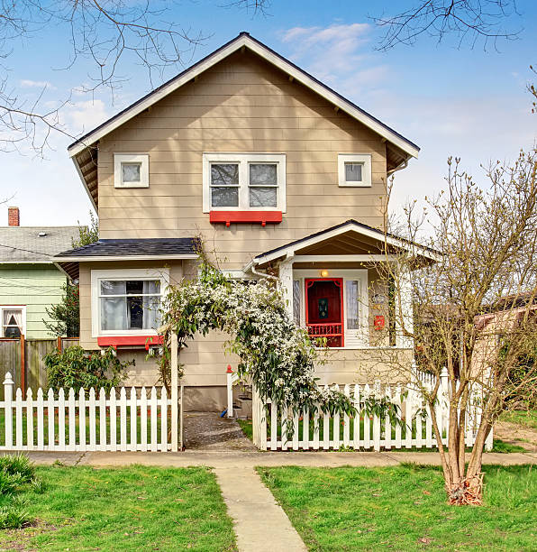 istock Perfect vintage home with white fence. 481674900