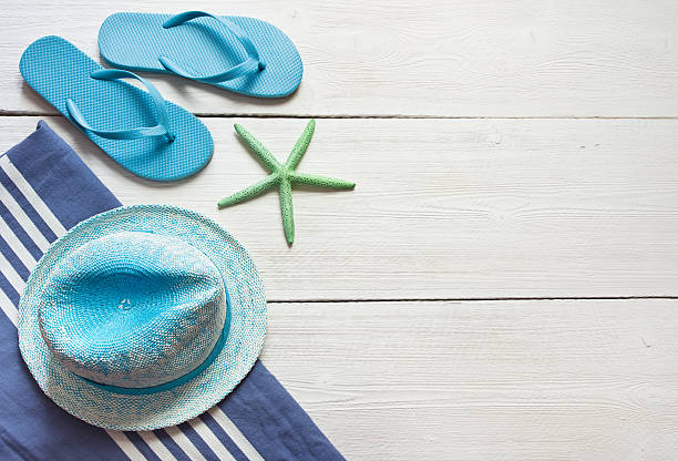 istock beach accessories on white wooden boards 481682386
