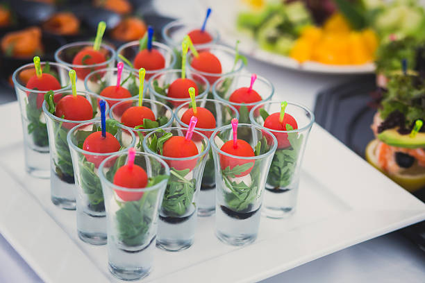 istock Beautifully decorated catering banquet table with different food snacks appetizers 481683064