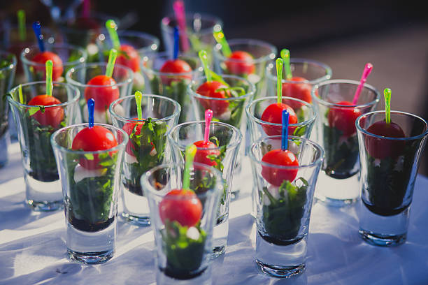 istock Beautifully decorated catering banquet table with different food snacks appetizers 481683184
