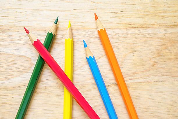 istock Color pencils on wood background 481683828