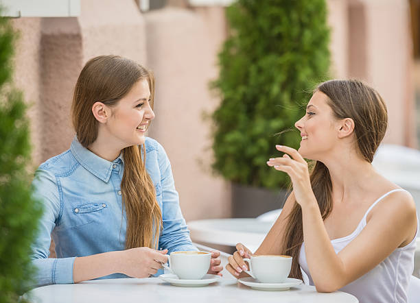 istock Girls in summer cafe 481686240