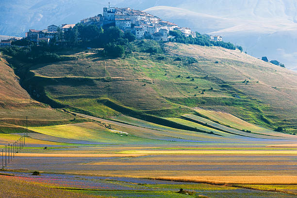 Castelluccio di Norcia (Italy), Village on a green hill stock photo