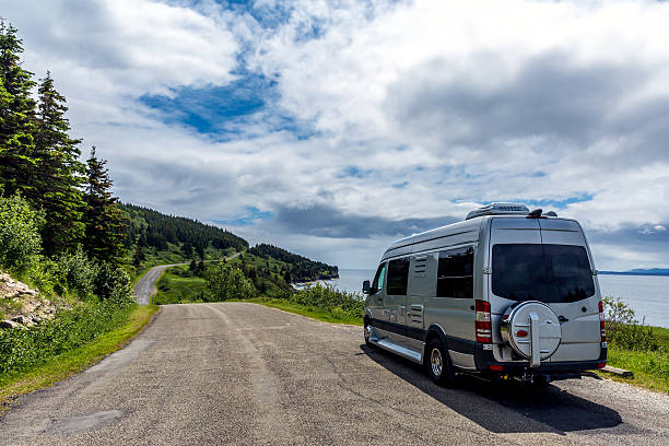 istock Camper Van Motorhome Parked on a Country Road 481690078