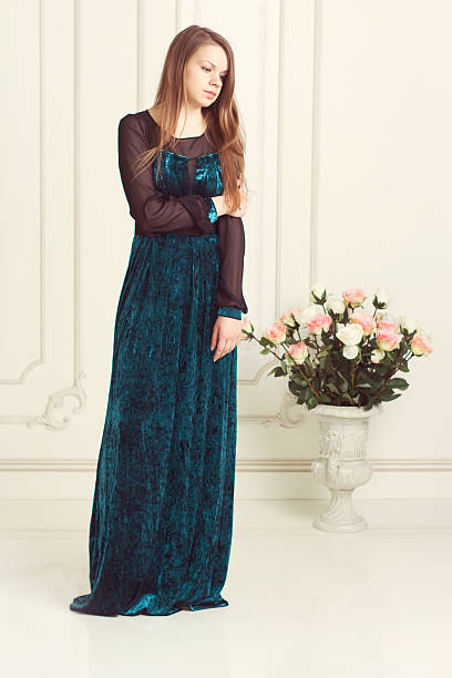 istock girl in a beautiful dress 481692543