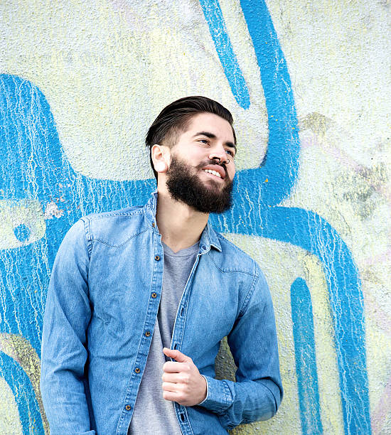 istock Happy young man smiling outdoors 481692671