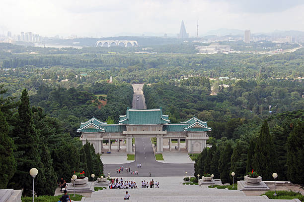 North Korea DPRK: Pyongyang from the Revolutionary Martyrs' Cemetery Pyongyang, North Korea - August 14, 2013: View of Pyongyang from the Revolutionary Martyrs' Cemetery (north of Pyongyang). kim il sung mausoleum stock pictures, royalty-free photos & images