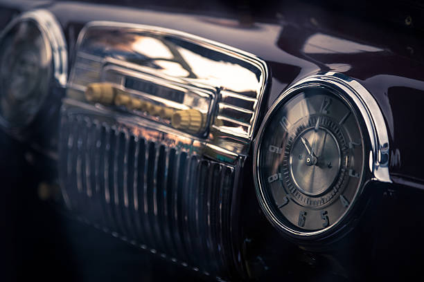 istock Clock in retro interior of old automobile 481695685