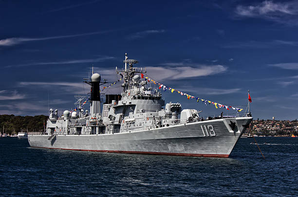 Sydney, Australia – October 5 2013: The Chinese guided missile destroyer PLANS Qingdao joins over 40 other warships from around the world to celebrate the centenary of the Australian Navy on October 5 2013 in Sydney, Australia.