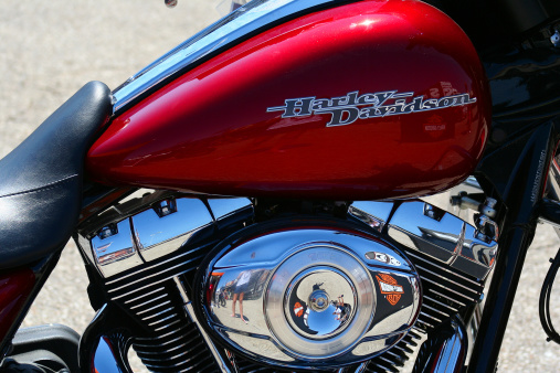 Ennis, Texas, USA - September 25, 2011: Close up of a red gas tank and engine on a 2012 Harley Davidson motorcycle on display at a national drag race in Ennis, TX.