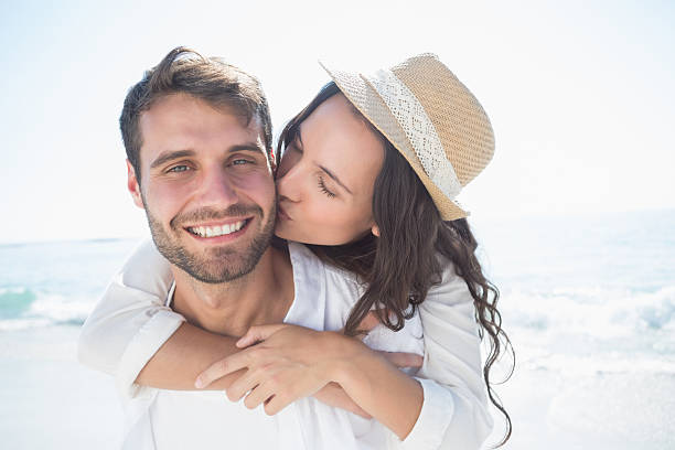 istock Handsome man doing piggy-back to his girlfriend 481698882