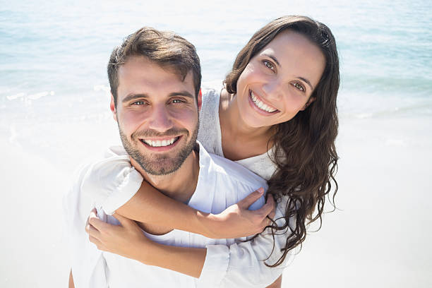 istock Handsome man doing piggy-back to his girlfriend 481698884