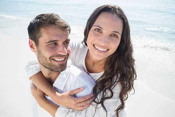 istock Handsome man doing piggy-back to his girlfriend 481698888