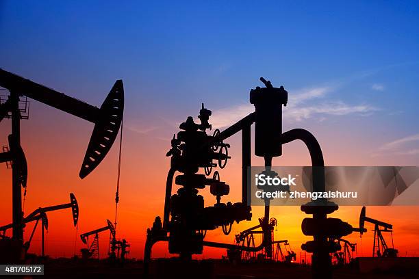 Oil Pipeline And Pumping Unit Of The Silhouette Stock Photo - Download Image Now - 2015, Agreement, Agricultural Field
